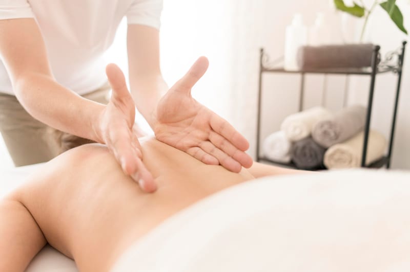 Professional massage therapist at Serenity Spa